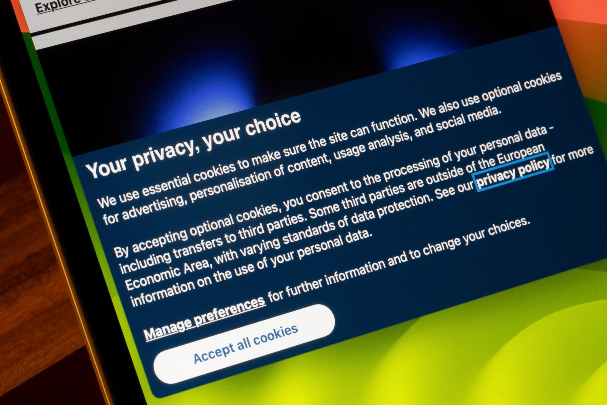 Cookie consent banner on a mobile device screen, highlighting user privacy choices and options to manage cookie preferences or accept all cookies.